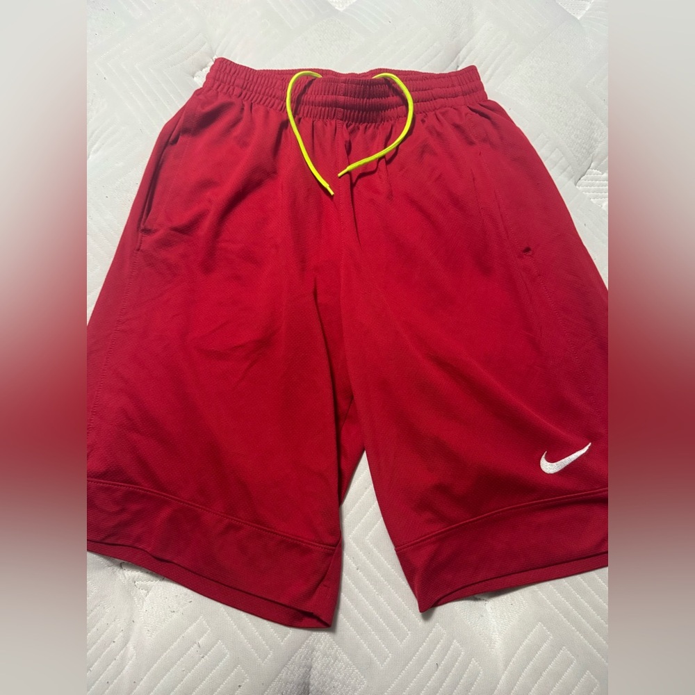 Nike Men's Red Athletic Mesh Shorts with Yellow Drawstring